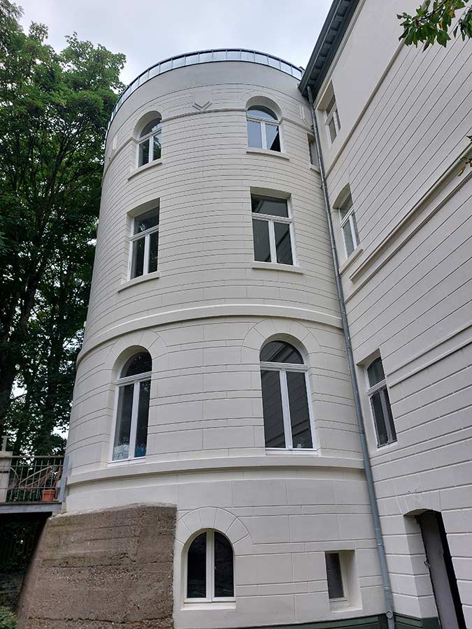 Referenzprojekt Fassade eines runden Altbaus